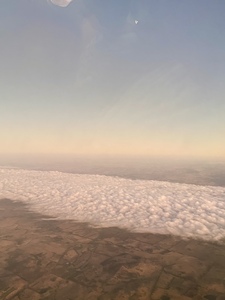 Photo of the earth and sky with a yellow to blue gradient