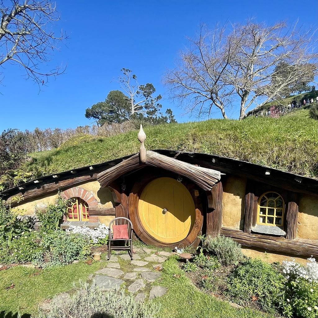 A Hobbit hole with a yellow door