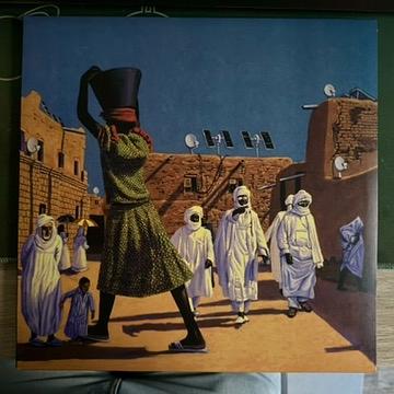 The cover of "The Bedlam in Goliath" — A piece by Jeff Jordan entitled "Agadez"